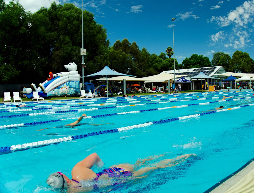 person swimming in pool