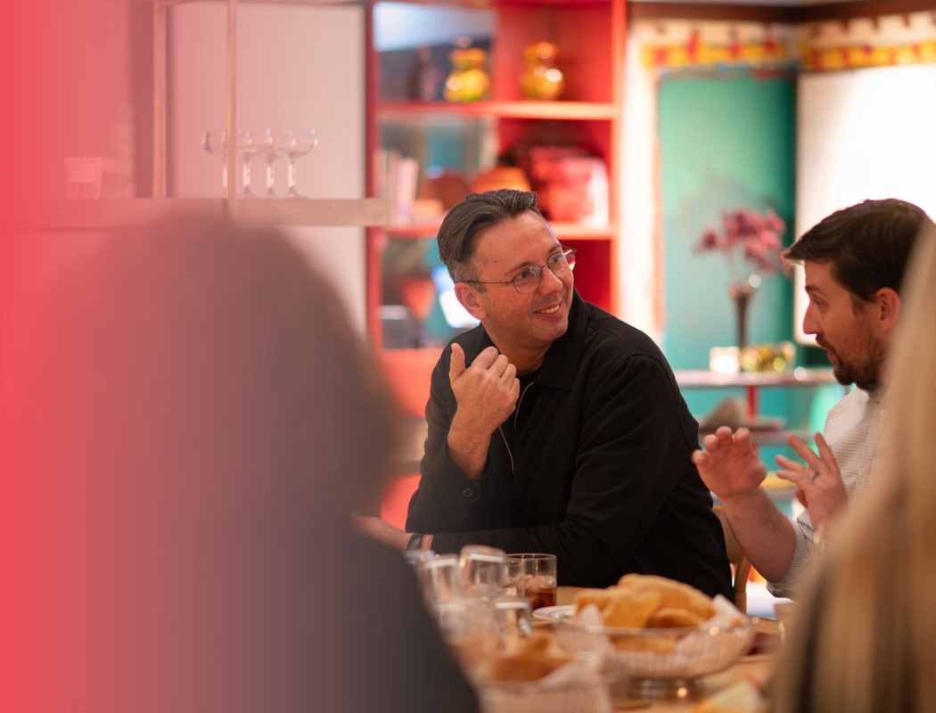 people talking at dining table