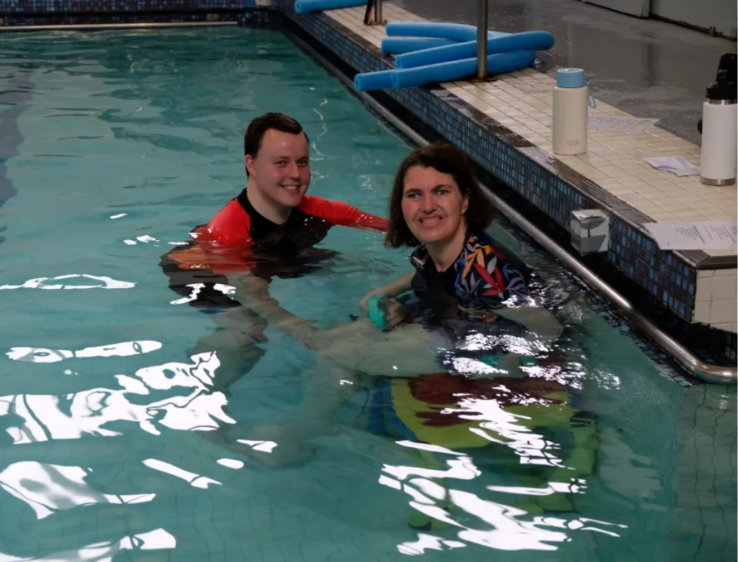 man and woman in swimming pool