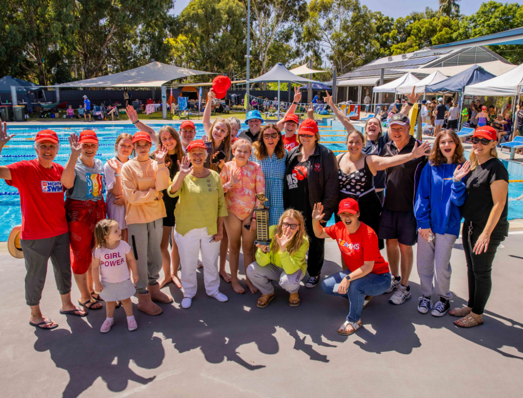 group photo at mighty swim event